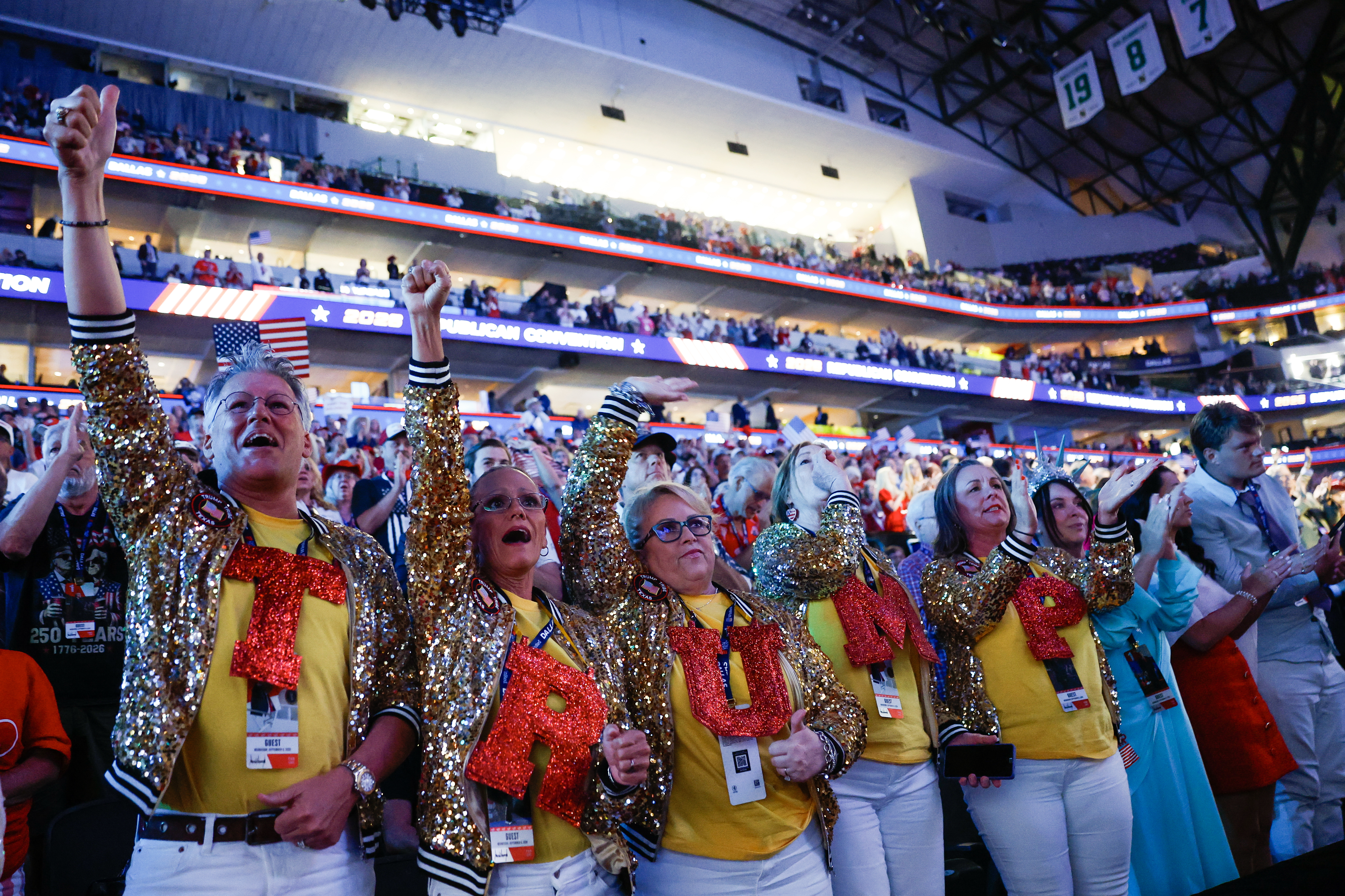 Attendees wear letters that spell out TRUMP on the first day of the 2026 Republican National Convention on Sept. 9, 2026 in Dallas, Texas.